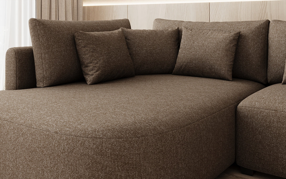Designer Ecksofa Ando mit breiter Ottomane in Strukturstoff