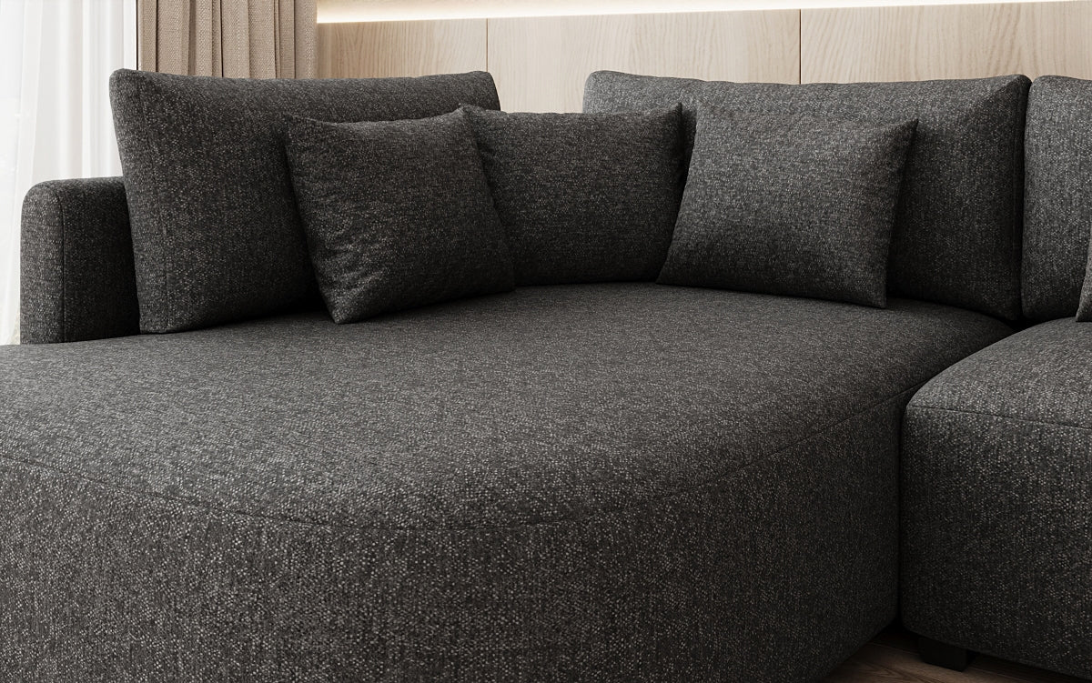 Designer Ecksofa Ando mit breiter Ottomane in Strukturstoff