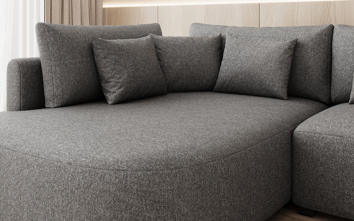 Designer Ecksofa Ando mit breiter Ottomane in Strukturstoff