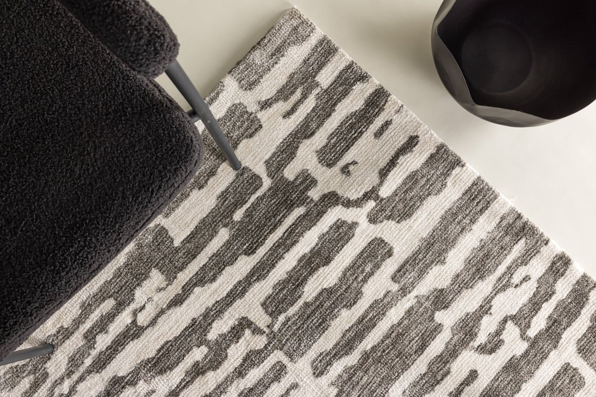 Teppich Inara – in Beige oder Grau aus Polyester & Baumwolle