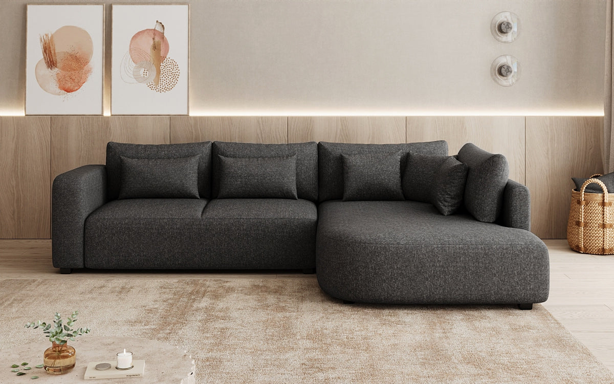 Designer Ecksofa Ando mit breiter Ottomane in Strukturstoff