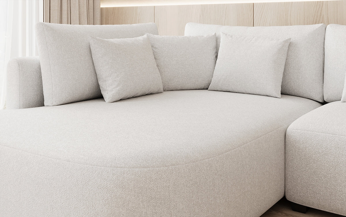 Designer Ecksofa Ando mit breiter Ottomane in Strukturstoff