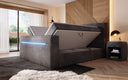 Boxspringbett Sejour mit TV Lift, RGB und Stauraum in Cord