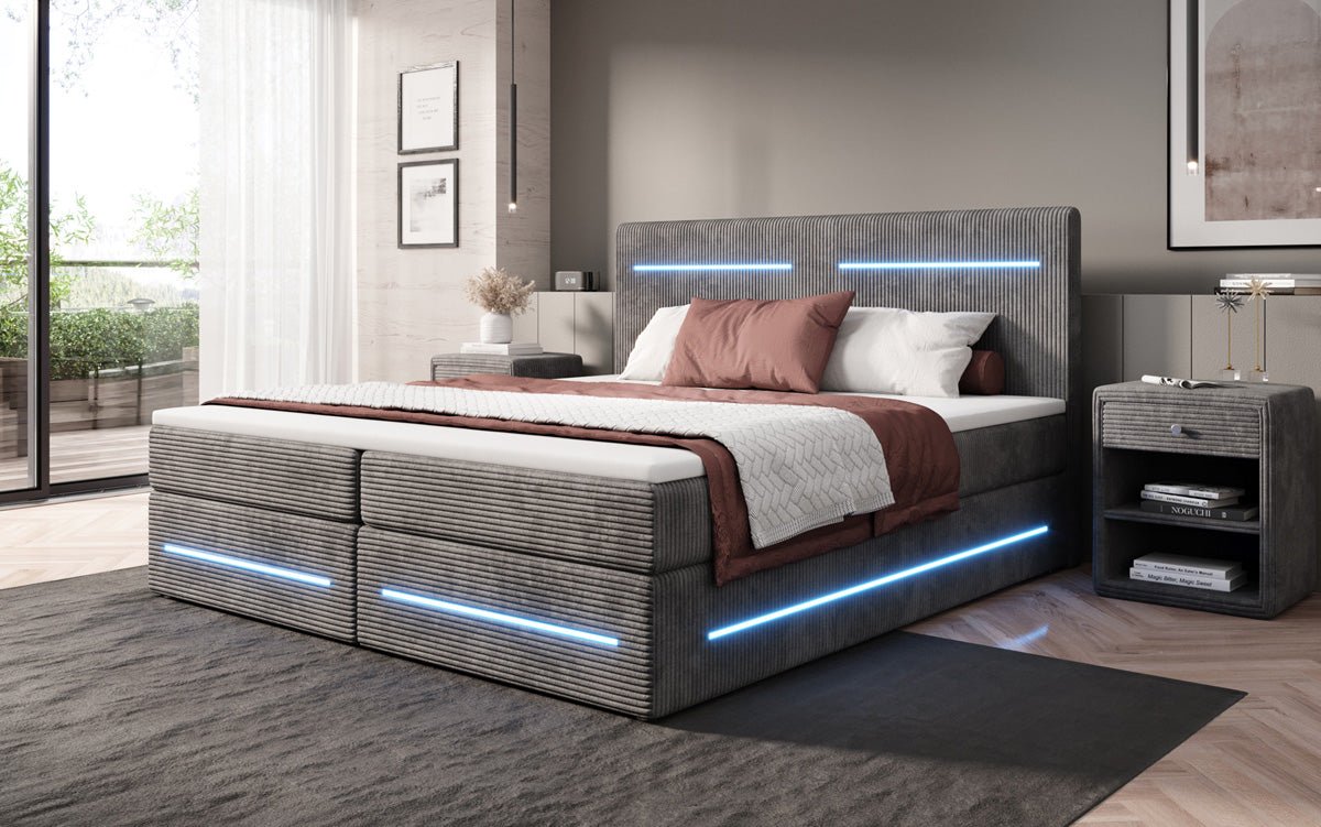 Lit boxspring Lara avec espace de rangement et LED en Côtelé