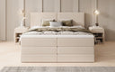 Boxspringbett Ophelia mit hochklappbarem Stauraum in Teddy Bouclé