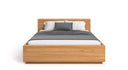 Designer Holzbett Calveno aus massiver Eiche mit Stauraum und geraden Headboard