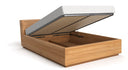 Designer Holzbett Calveno aus massiver Eiche mit Stauraum und geneigtem Headboard